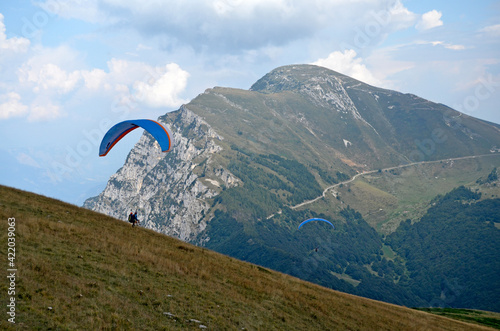 Flying on a paraglider.  View of the Monte Baldo mountain, Italy, from a height.