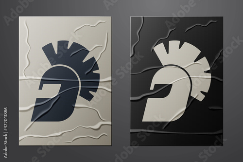 White Greek helmet icon isolated on crumpled paper background. Antiques helmet for head protection soldiers with a crest of feathers or horsehair. Paper art style. Vector