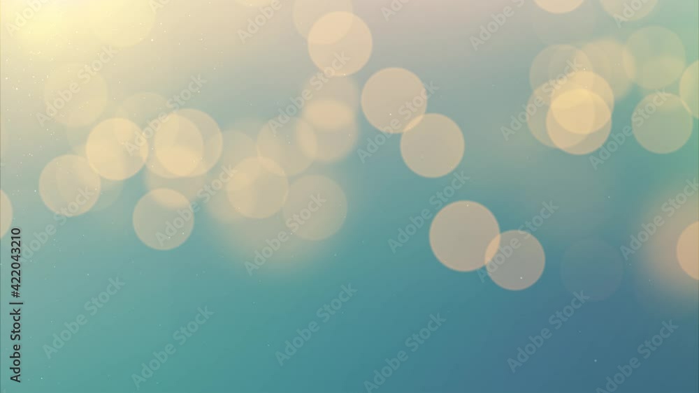 Pastel golden blue bokeh background. Shining gold Easter spring backdrop. Falling sparkling particles. Blurred beautiful animated wallpaper. Wonderful golden bokeh. Seamless loop
