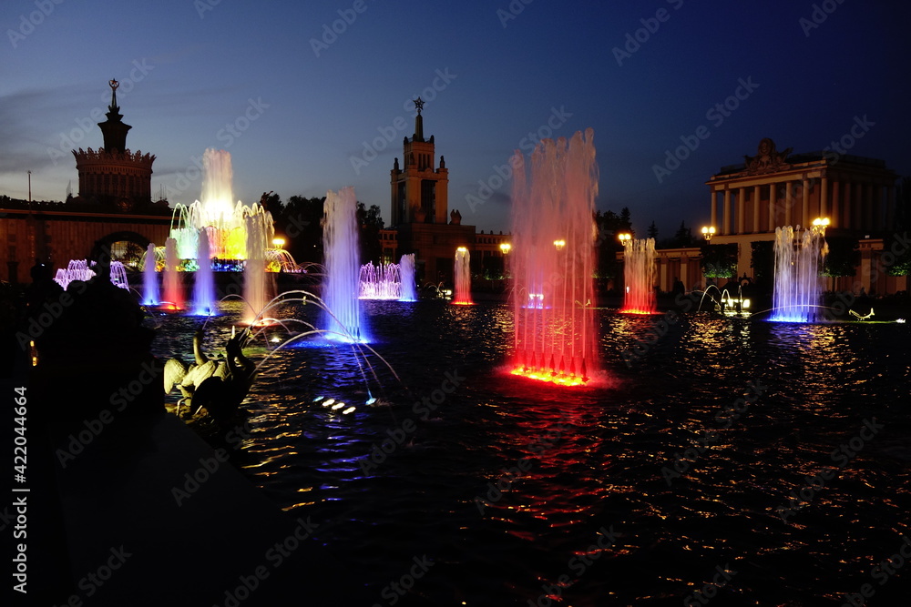 Color lighted fountains at night at Moscow's VDNKh center