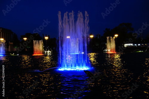 Color lighted fountains at night at Moscow's VDNKh center