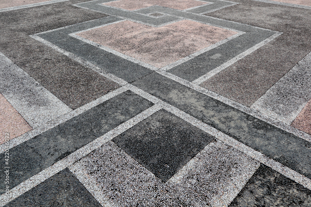 simetric pattern or texture at stone floor for use background pamflet