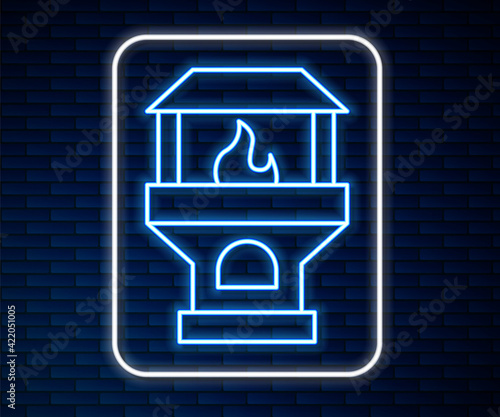 Glowing neon line Brick stove icon isolated on brick wall background. Brick fireplace, masonry stove, stone oven icon. Vector