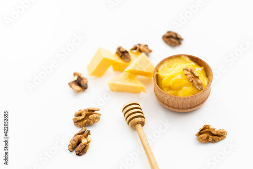 Sweet honey and nuts, isolated on white background