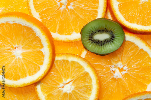 Citrus orange fruits slices and kiwi slice background