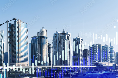 Cityscape skyscrapers of downtown  UAE. Modern skyline of the capital of the Emirate of Dubai. Center of international trading of Western Asia. Traffic. FOREX graph and chart concept. Double exposure