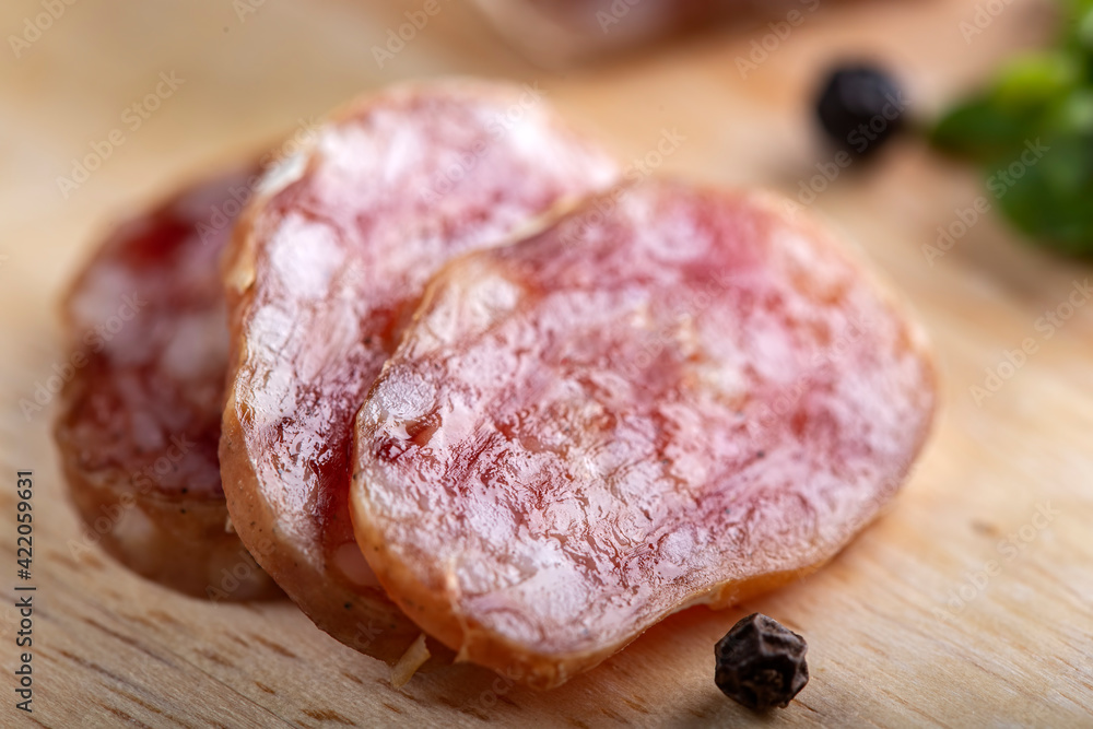 Italian salami slices Italian salami slices