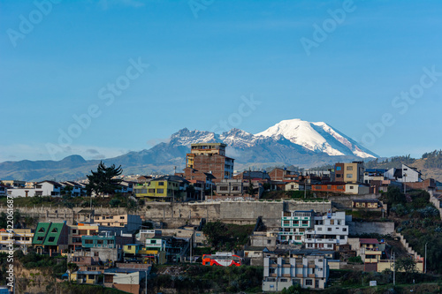 Landscape with a volcano and a beautiful city 