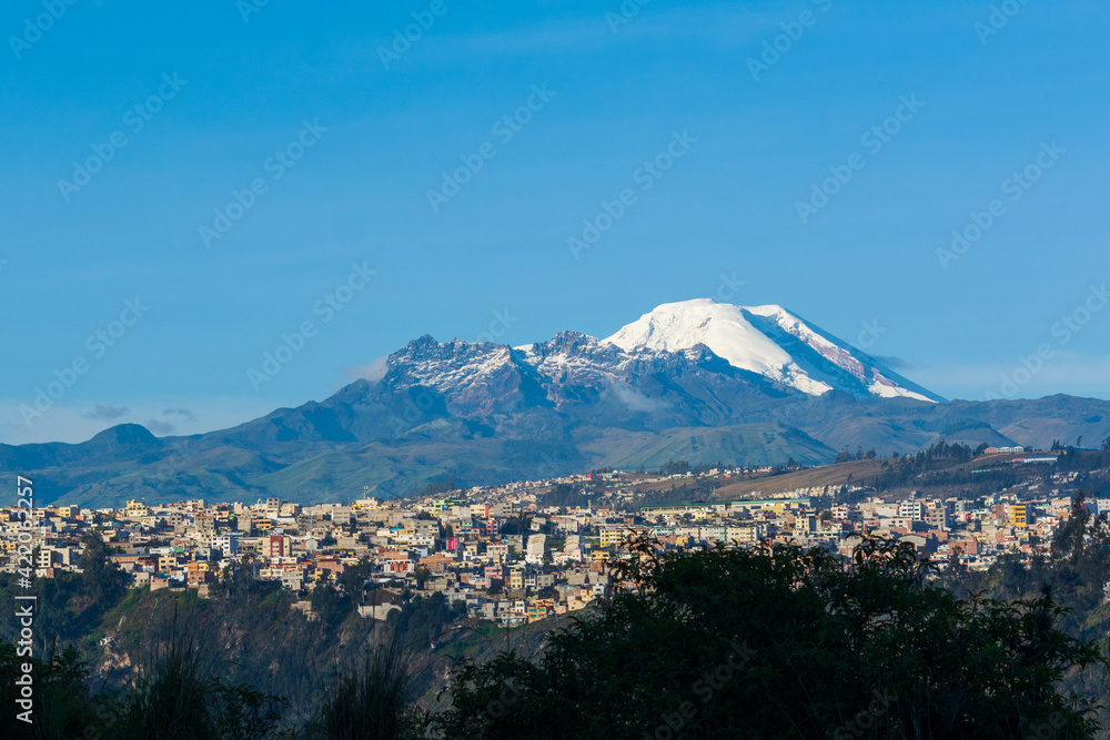 Landscape with a volcano and a beautiful city Landscape with a volcano and a beautiful city