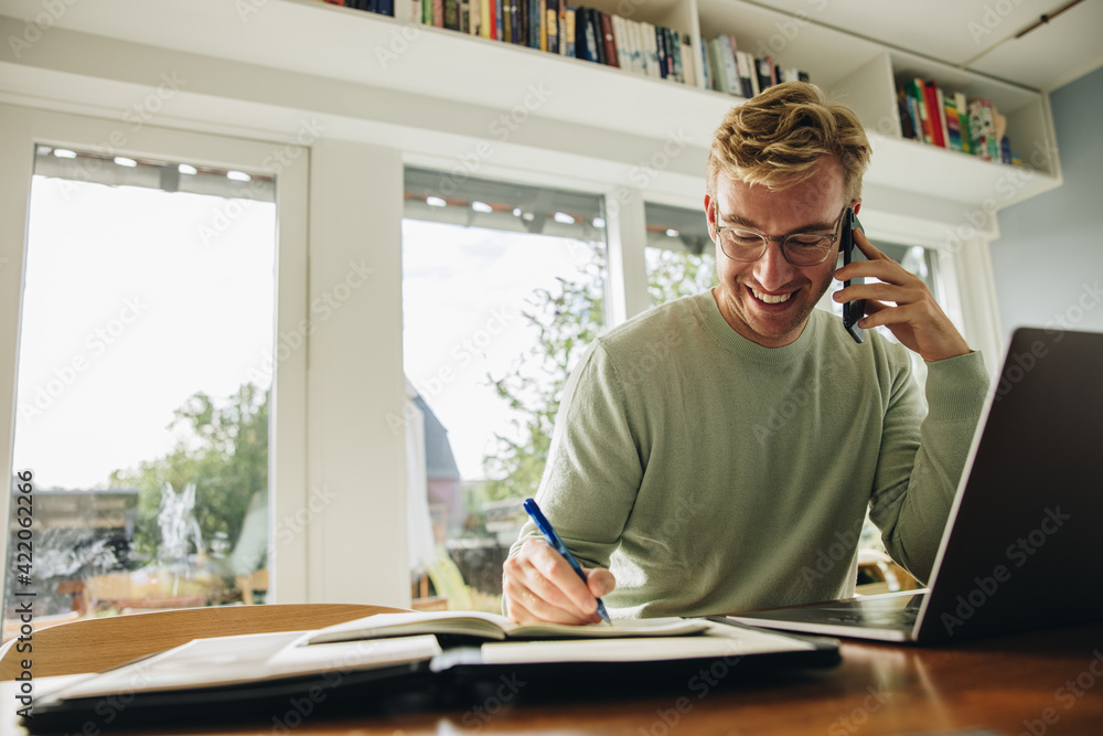 © Jacob Lund - Man staying at home and working