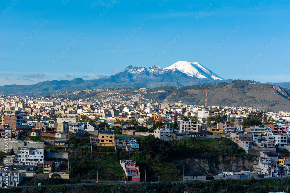 Landscape with a volcano and a beautiful city 