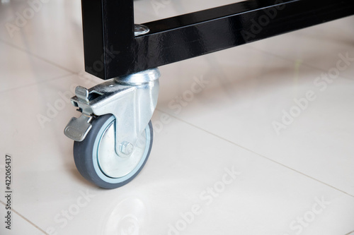 Wheel for carts. Polyurethane caster wheels or trolley wheels with copy space. Metal wheel braked.