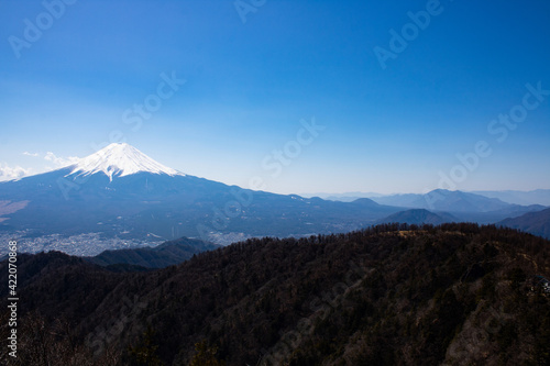 Spectacular and Beautiful Mt.Fuji covered with snow and Mt.Mitsutoge