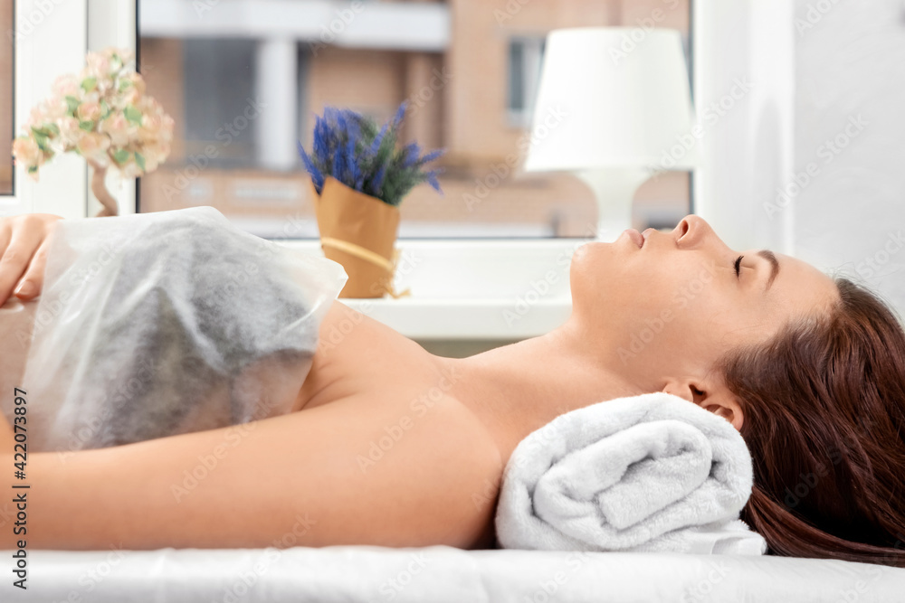 Neck massage close-up. Young, beautiful girl at spa procedures. Body care, oriental massage treatments, posture correction, beauty treatments. Neck massage close-up. Young, beautiful girl at spa procedures. Body care, oriental massage treatments, posture correction, beauty treatments.