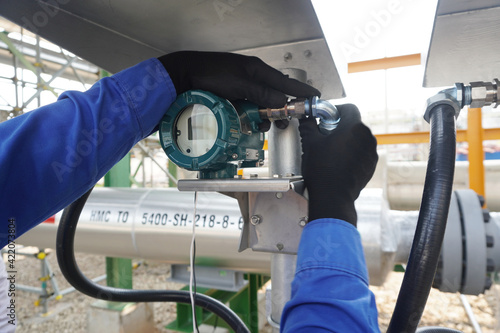 Temperature transmitter during install the power cable for measuring in steam system in gas pipeline.