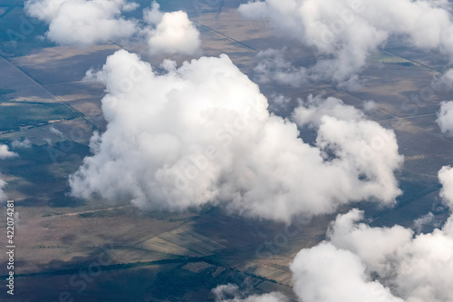 Beautiful fluffy clouds are seen from an unusual angle