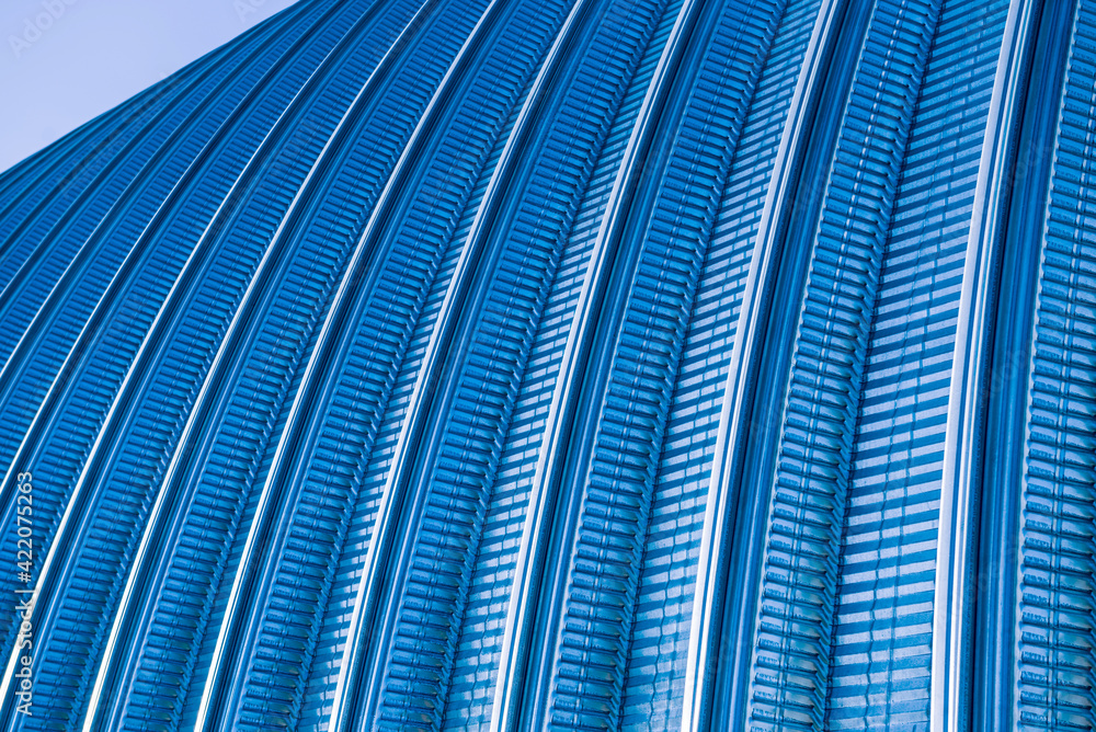 The surface of a industrial metal roof. Abstract background The surface of a industrial metal roof. Abstract background