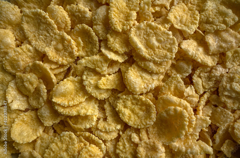 The texture of yellow cornflakes for breakfast