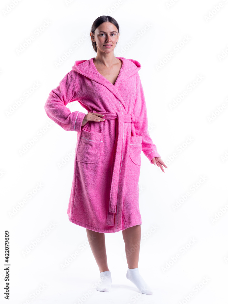 woman in a Bathrobe on an isolated white background with a smile on her face. woman in a Bathrobe on an isolated white background with a smile on her face.