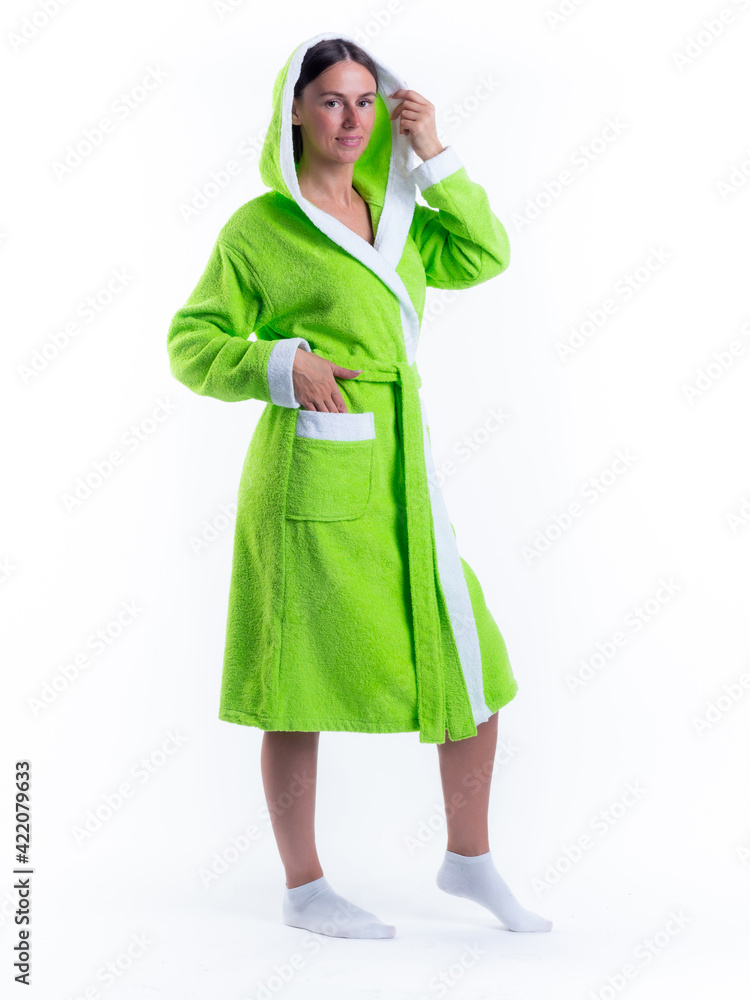 woman in a Bathrobe on an isolated white background with a smile on her face. woman in a Bathrobe on an isolated white background with a smile on her face.