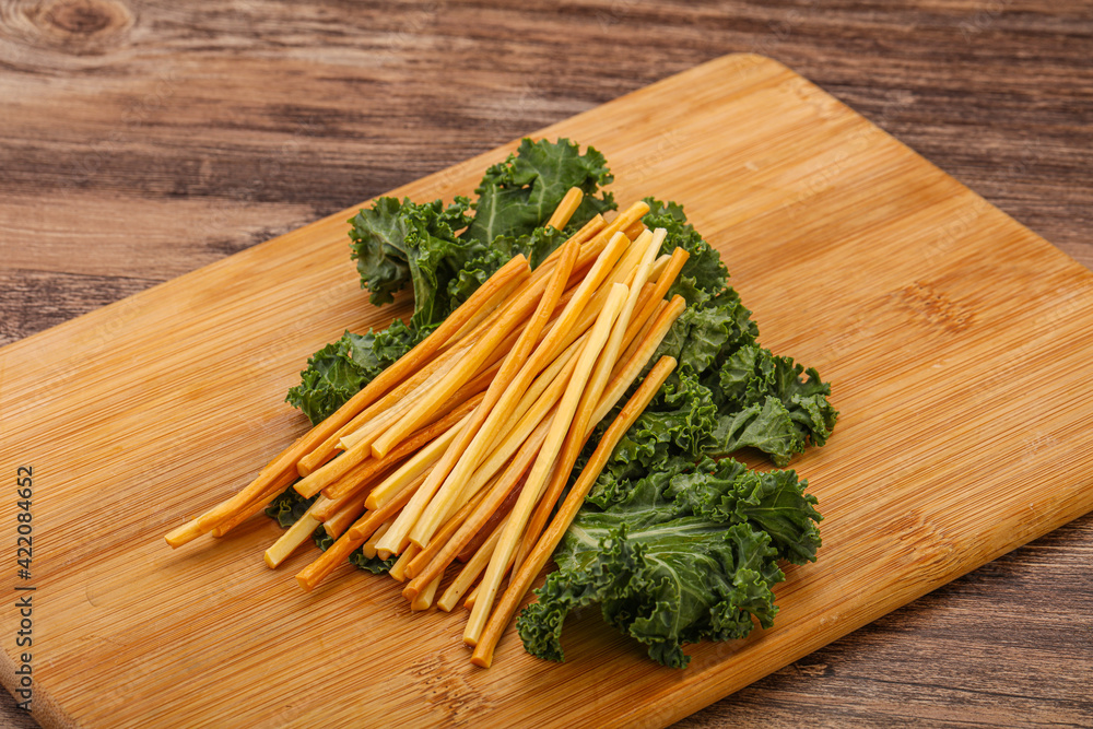 Chechel cheese sticks over board Chechel cheese sticks over board