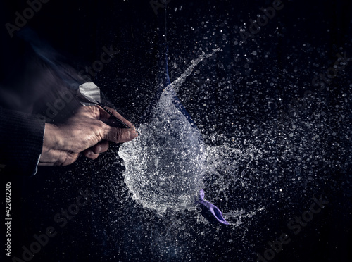 Fototapeta Naklejka Na Ścianę i Meble -  balloon filled with water that explodes when pierced with a dart