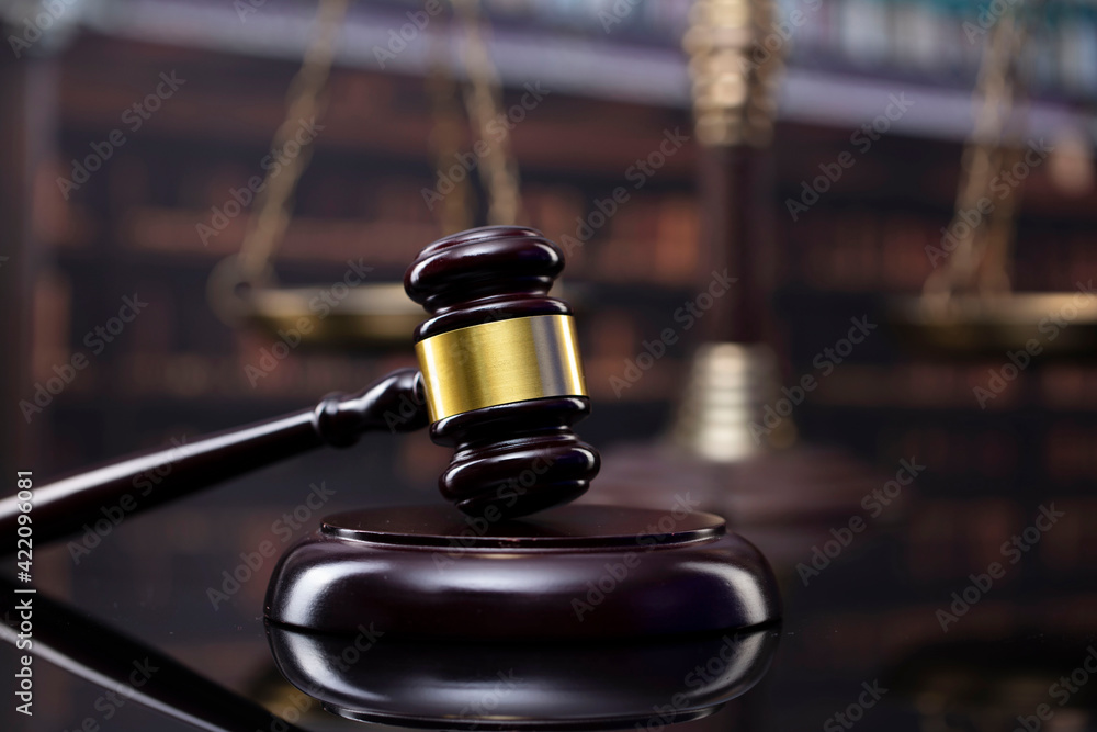 Law theme. Court library - gavel of the judge and books. Law theme. Court library - gavel of the judge and books.