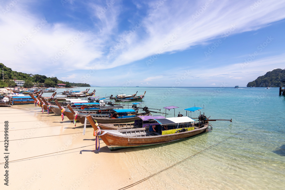 Long-tail boats at Ao Ton Sai pier, Phi Phi Don in Krabi, Thailand. The main pier of Phi Phi island.