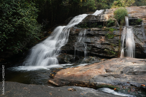 waterfalls is natural beautiful in forest complete of Pha Dok Siew Waterfall Natural Trail in Doi Inthanon National Park  Thailand. The abundance of asian forests.