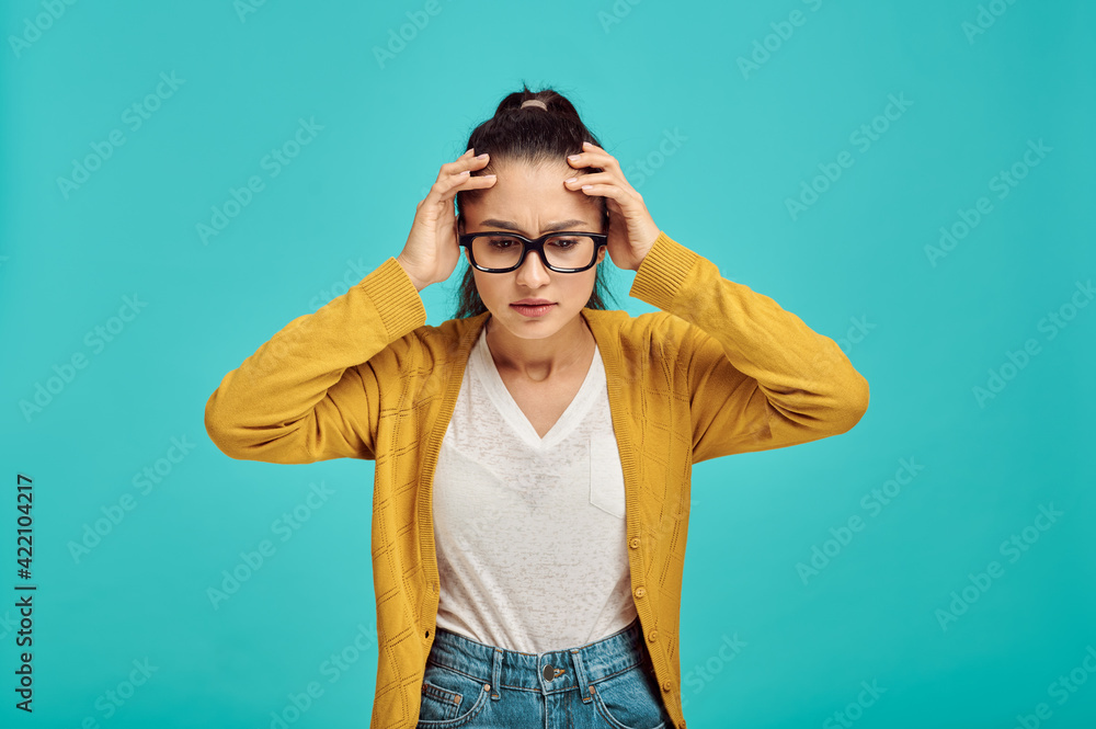 Stressed woman in glasses, negative emotion Stressed woman in glasses, negative emotion