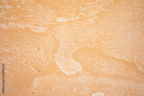 Retro orange cement wall background for texture.