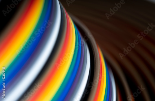 Cable and wires rainbow colored blurred close-up  macro shot  Texture or background. wires colour backfground