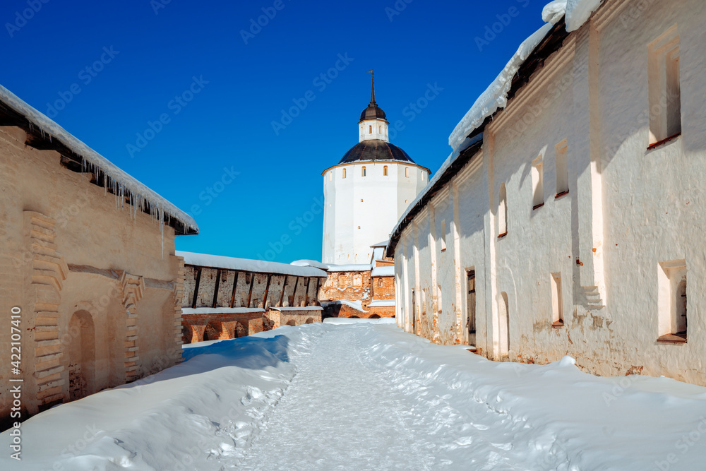 View of the inner buildings of the Kirillo-Belozersky Monastery and the Big Merezhnaya Tower on a frosty sunny winter day, Kirillov, Vologda region, Russia