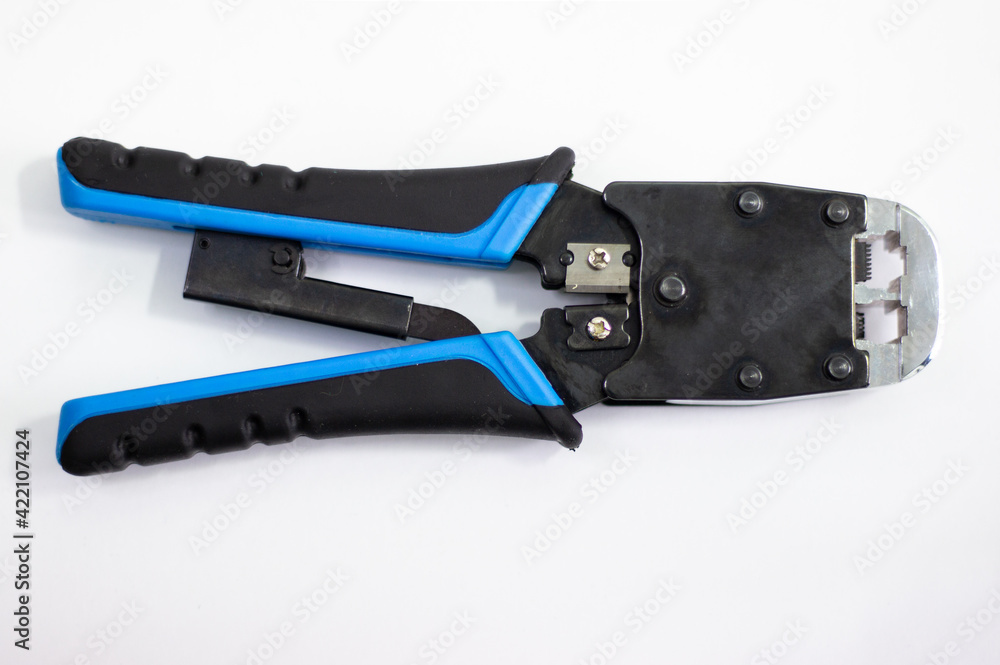 Twisted pair crimper. Device for crimping network cable. Tool for installing RG-45 on cord. Twisted pair crimper. Device for crimping network cable. Tool for installing RG-45 on cord.
