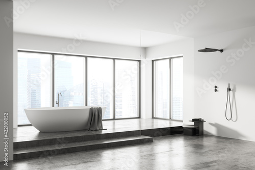 White bathroom interior and shower with panoramic windows