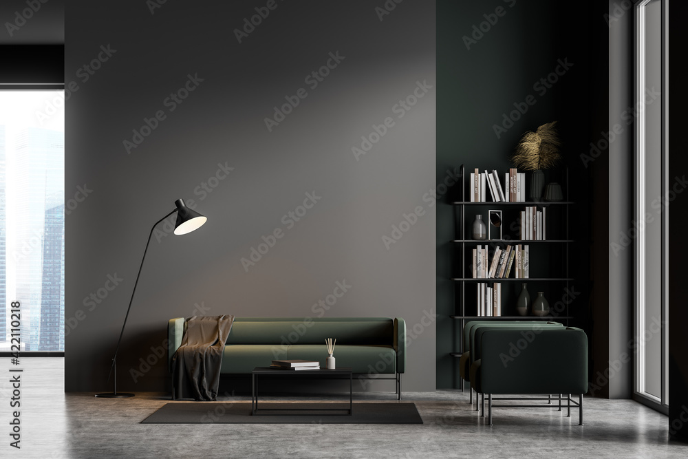 Dark grey modern living room interior with panoramic windows furnished by  green sofa and armchairs, coffee table, bookshelf, lamp. Concrete floor.  foto de Stock | Adobe Stock