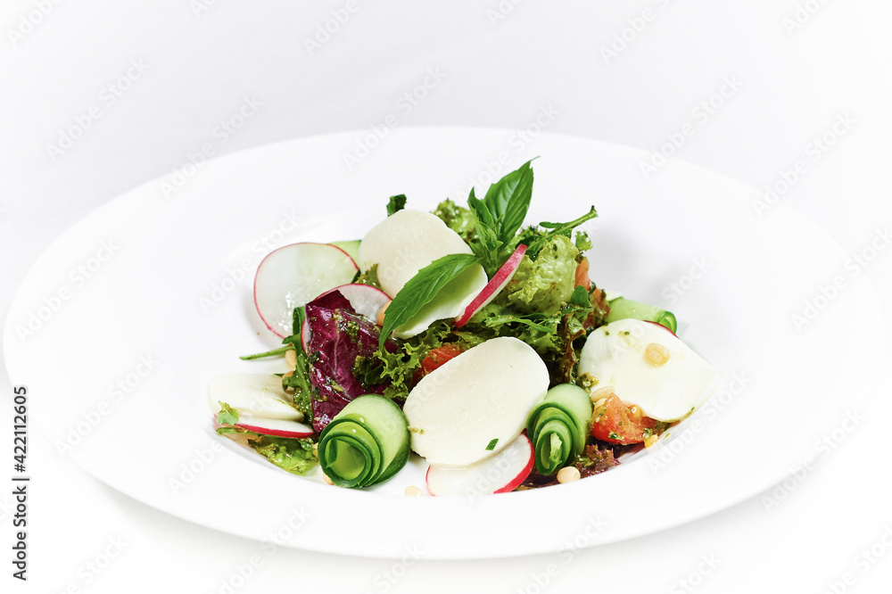 Vegetable and greens salade with mozzarella and pine nuts Vegetable and greens salade with mozzarella and pine nuts