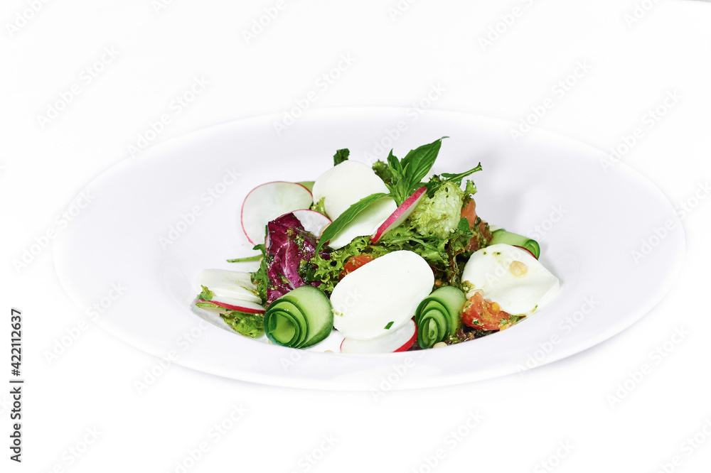 Vegetable and greens salade with mozzarella and pine nuts Vegetable and greens salade with mozzarella and pine nuts