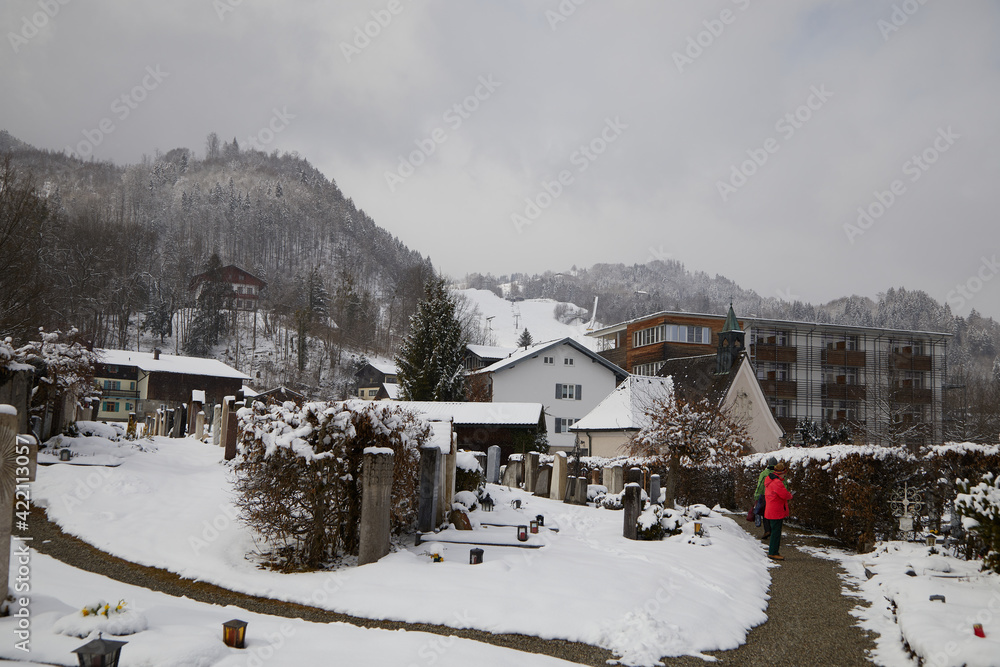 The Catolic cemetery of Oberaudorf. In the background you can see the snow-covered 
