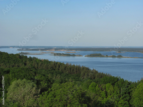 Wallpaper Mural landscape background: green forest, river with islands and blue sky Torontodigital.ca