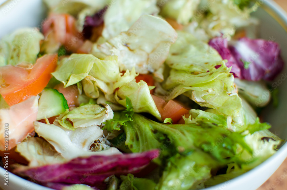Green vegan salad from green leaves mix and vegetables. Green vegan salad from green leaves mix and vegetables.