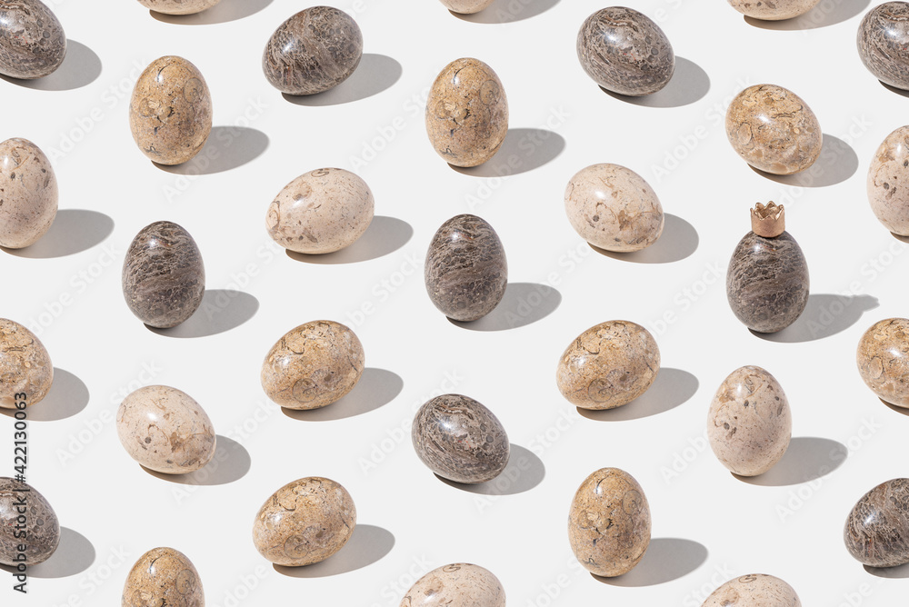 Pattern with decorated easter eggs on light gray background. Minimal concept. Isometric layout. Pattern with decorated easter eggs on light gray background. Minimal concept. Isometric layout.