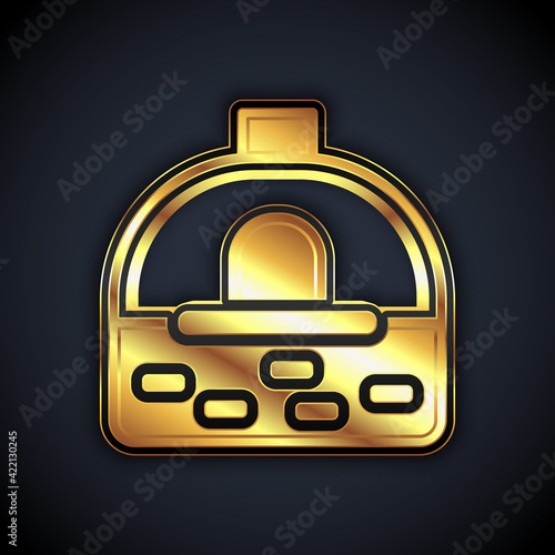 Gold Brick stove icon isolated on black background. Brick fireplace, masonry stove, stone oven icon. Vector