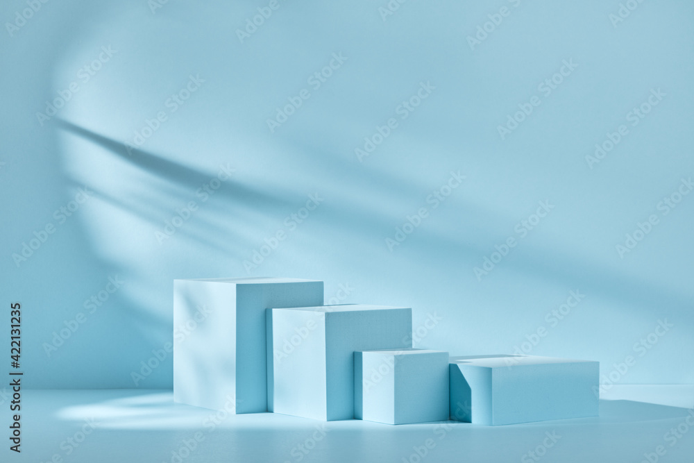 Blue background for product presentation with shadows and light. Empty podiums. Mockup. Blue background for product presentation with shadows and light. Empty podiums. Mockup.