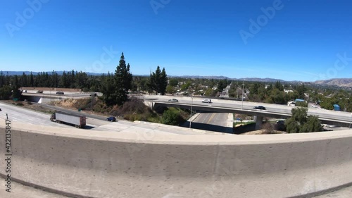 Wallpaper Mural Side view freeway driving plate shot of the San Fernando Valley from route 405 to 118 interchange bridge in Los Angeles, California. Torontodigital.ca