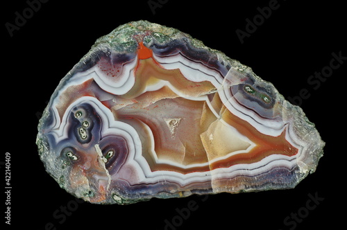 A cross section of the agate stone. Multicolored silica rings colored with metal oxides are visible. Origin: Rudno near Krakow, Poland.
