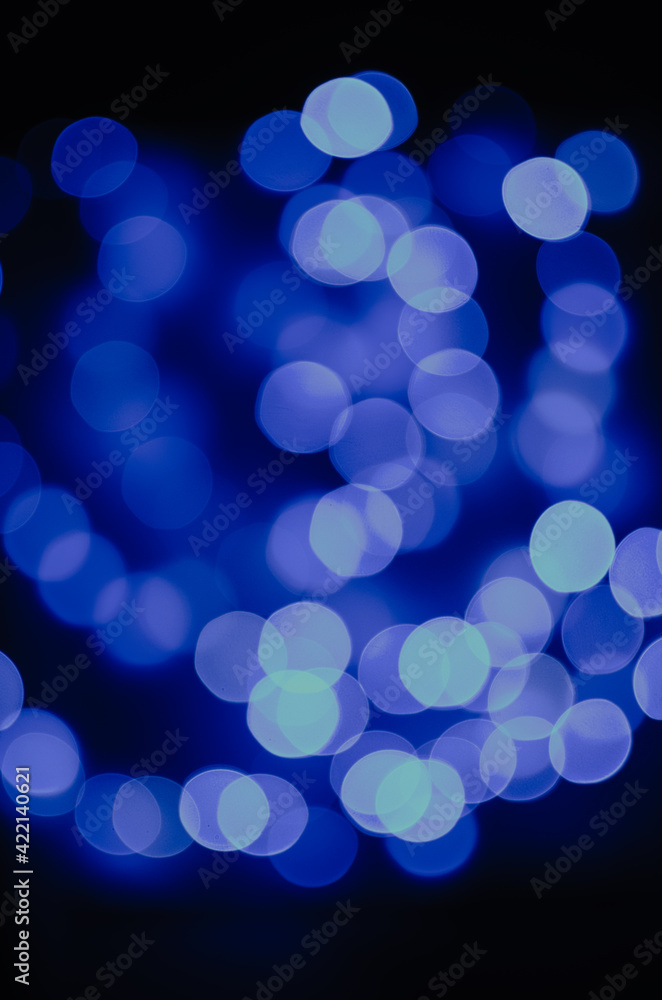 blue bokeh on black background blue bokeh on black background