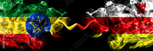 Ethiopia, Ethiopian vs United States of America, America, US, USA, American, Santa Barbara, California smoky mystic flags placed side by side. Thick colored silky abstract smoke flags.