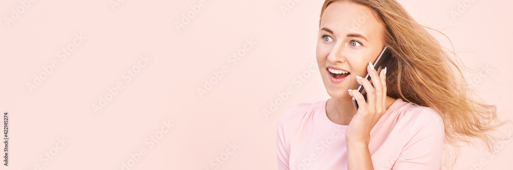 Pretty young woman talking by phone. Happy female person outdoors. Summer business portrait. Lady calling friends or boyfriend. Blonde long hair. Cute adult student at town Pretty young woman talking by phone. Happy female person outdoors. Summer business portrait. Lady calling friends or boyfriend. Blonde long hair. Cute adult student at town
