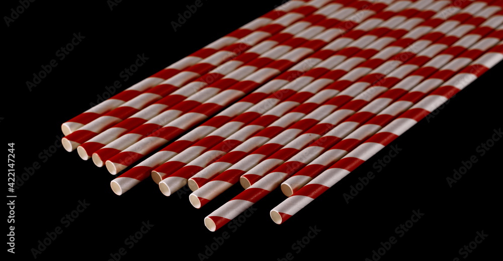 Paper straws pile isolated on black background and texture with clipping path, eco friendly Paper straws pile isolated on black background and texture with clipping path, eco friendly